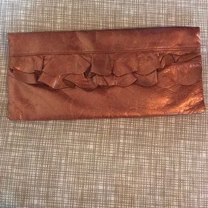 Metallic bronze HOBO leather clutch